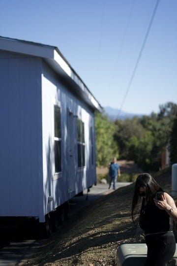 Side view of manufactured home during final placement