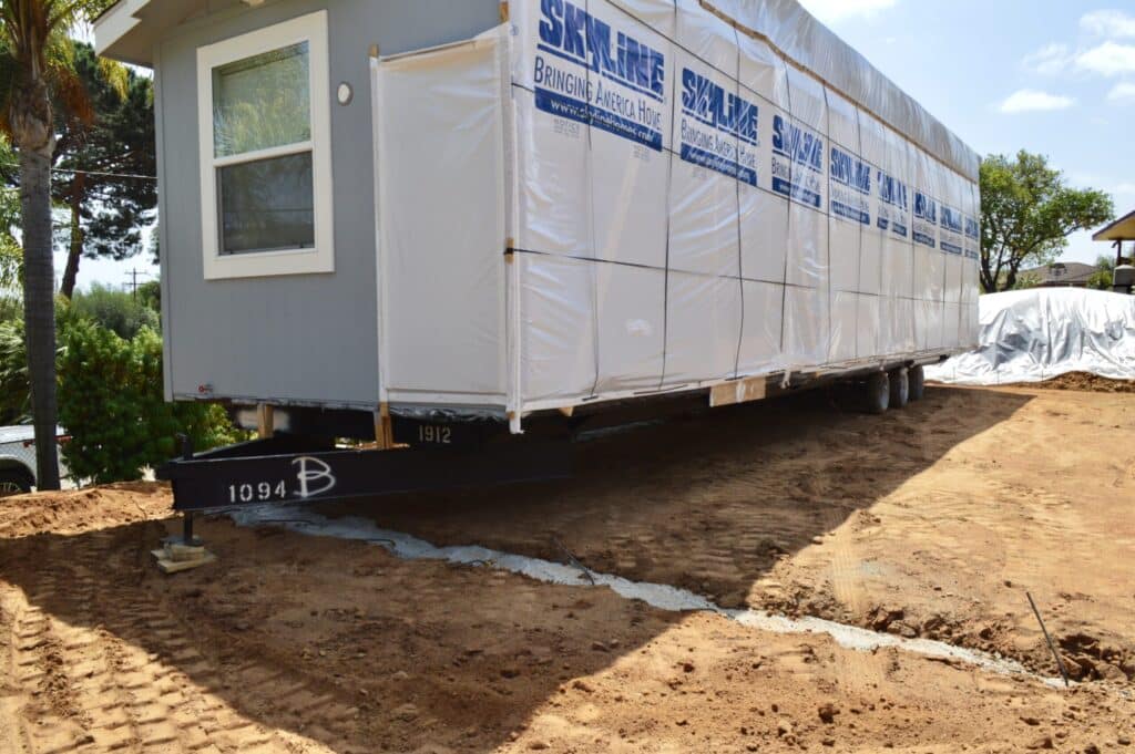 Home Transport Manufactured home wrapped for transport and delivery