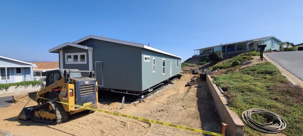 Manufactured home positioned on sloped residential lot
