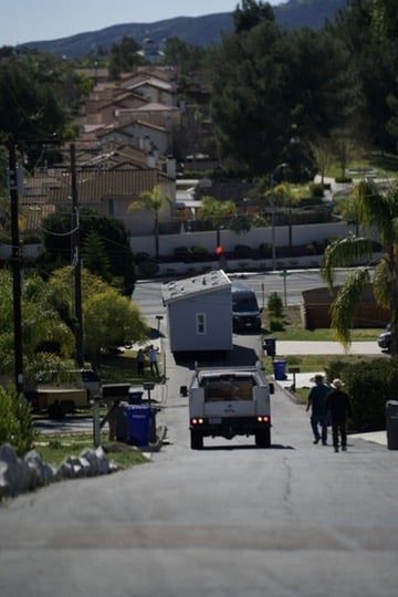 Manufactured home positioned in residential neighborhood