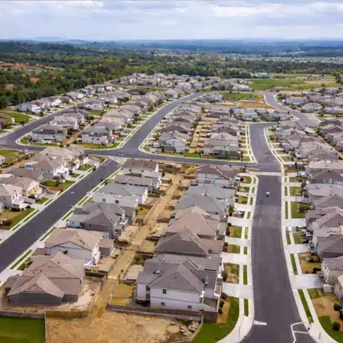 Completed subdivision layout Aerial view of a completed residential subdivision with organized streets and homes developed through land development in San Diego