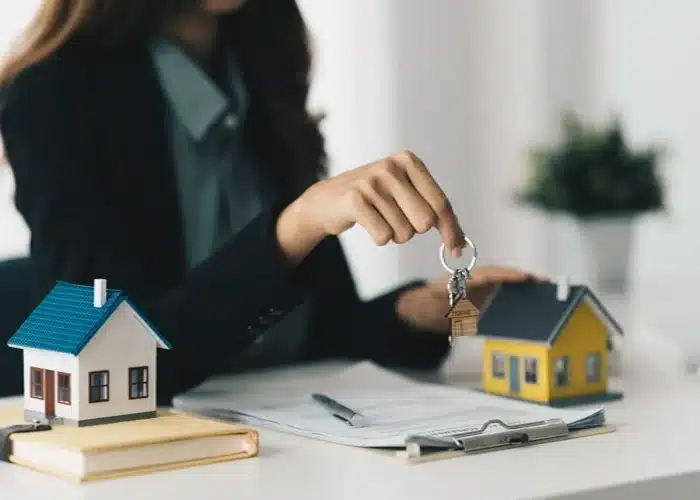 Home keys being handed over during a real estate transaction