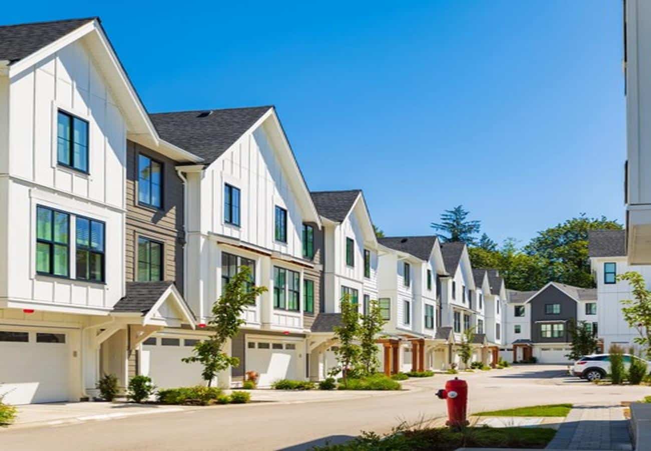 Row of well maintained residential homes illustrating rental housing options and neighborhood living
